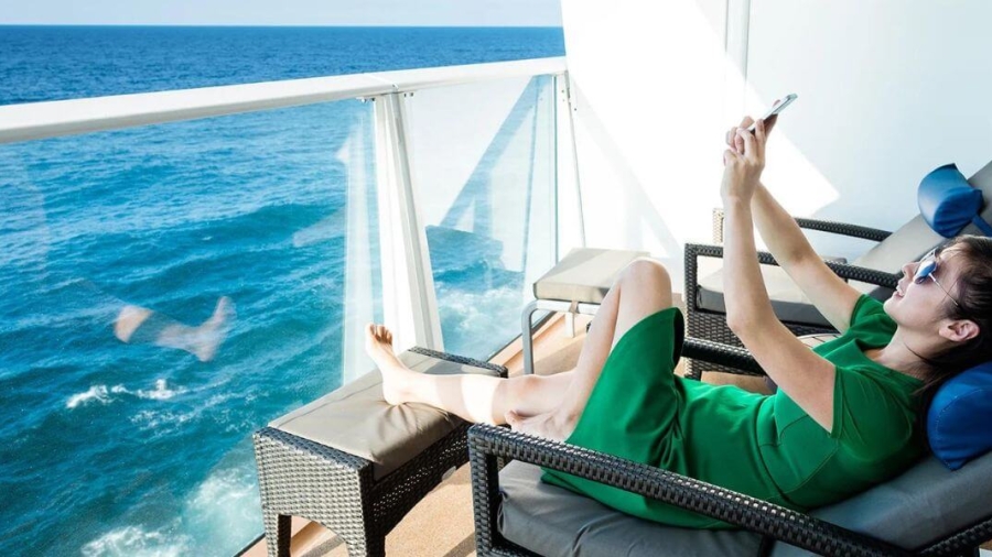 a-girl-using-phone-on-a-ship-1-1.jpg