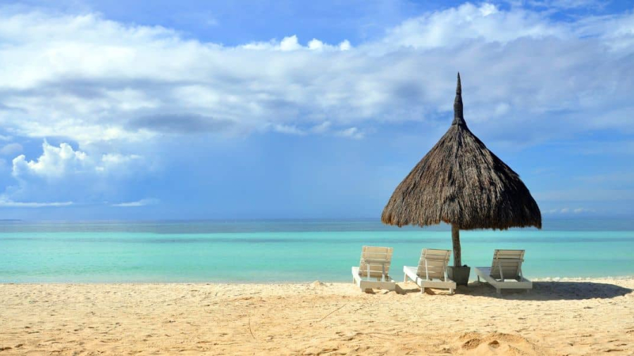Deck-Chairs-and-Umbrella-on-the-Beach.jpg