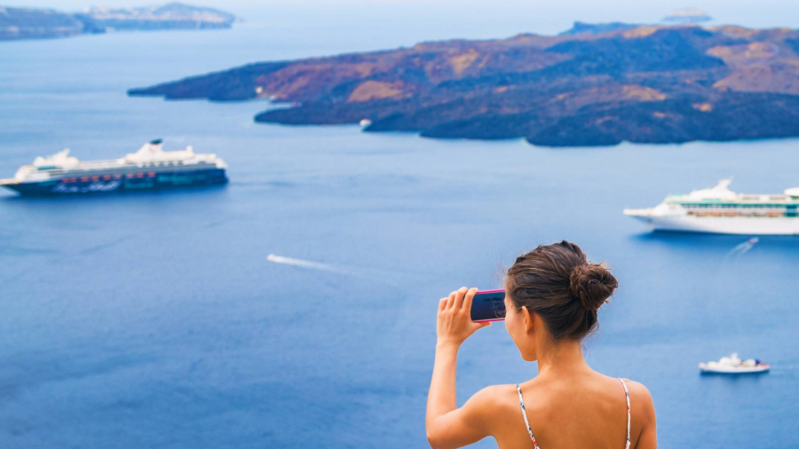 woman-phone-cruise-ships-scaled.jpg