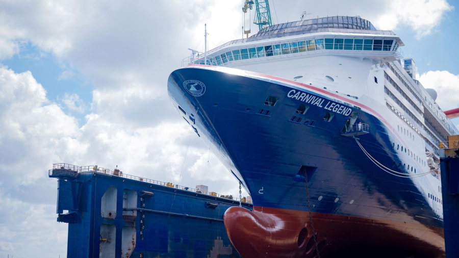 Carnival-Legend-returns-from-dry-dock-showcasing-new-bow-crest-scaled.jpg