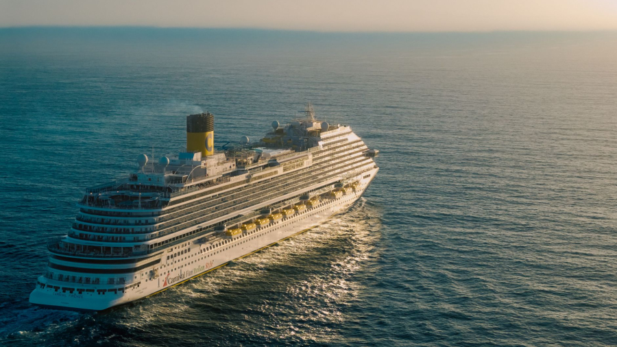 A large cruise ship sailing on the open ocean